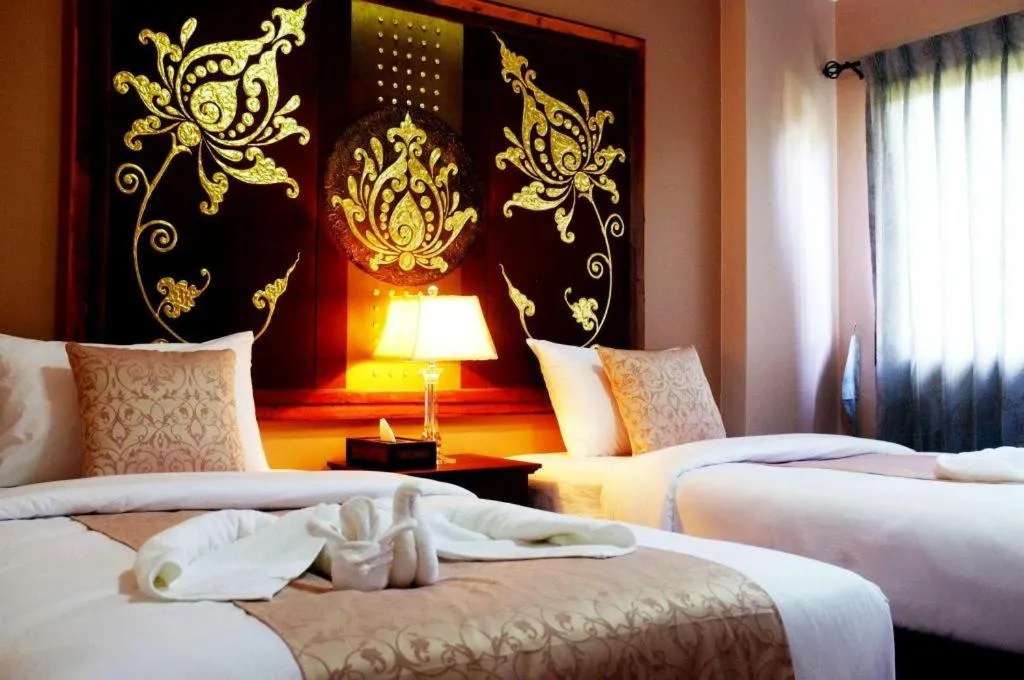 Bed in Ladawan Boutique Hotel