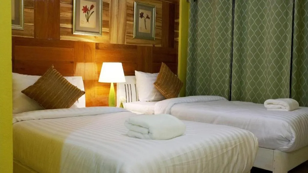 Bed in Ladawan Boutique Hotel