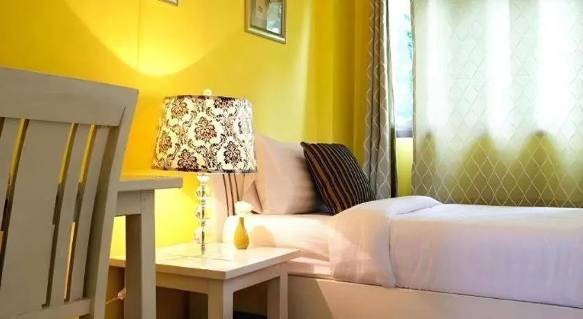 Bed in Ladawan Boutique Hotel