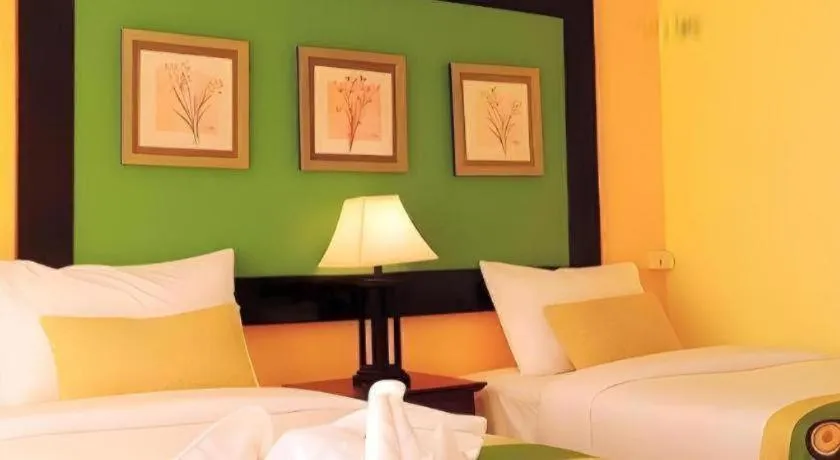 Bed in Ladawan Boutique Hotel