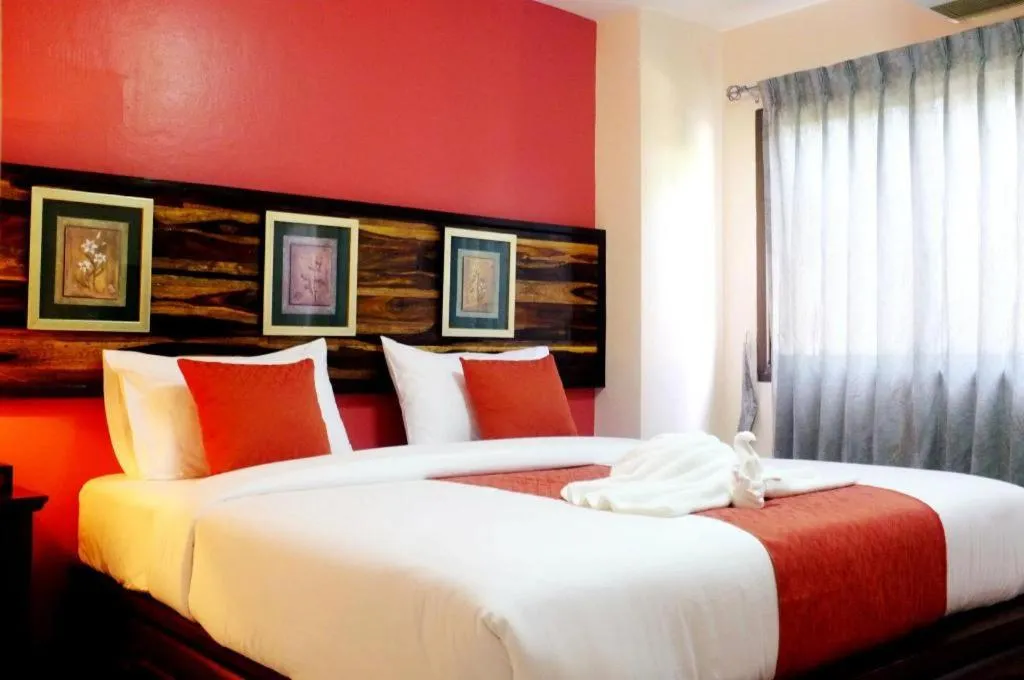 Bed in Ladawan Boutique Hotel