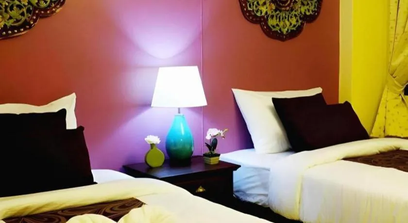 Bed in Ladawan Boutique Hotel