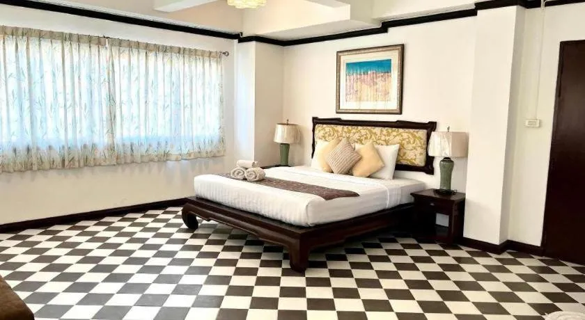 Bed in Ladawan Boutique Hotel