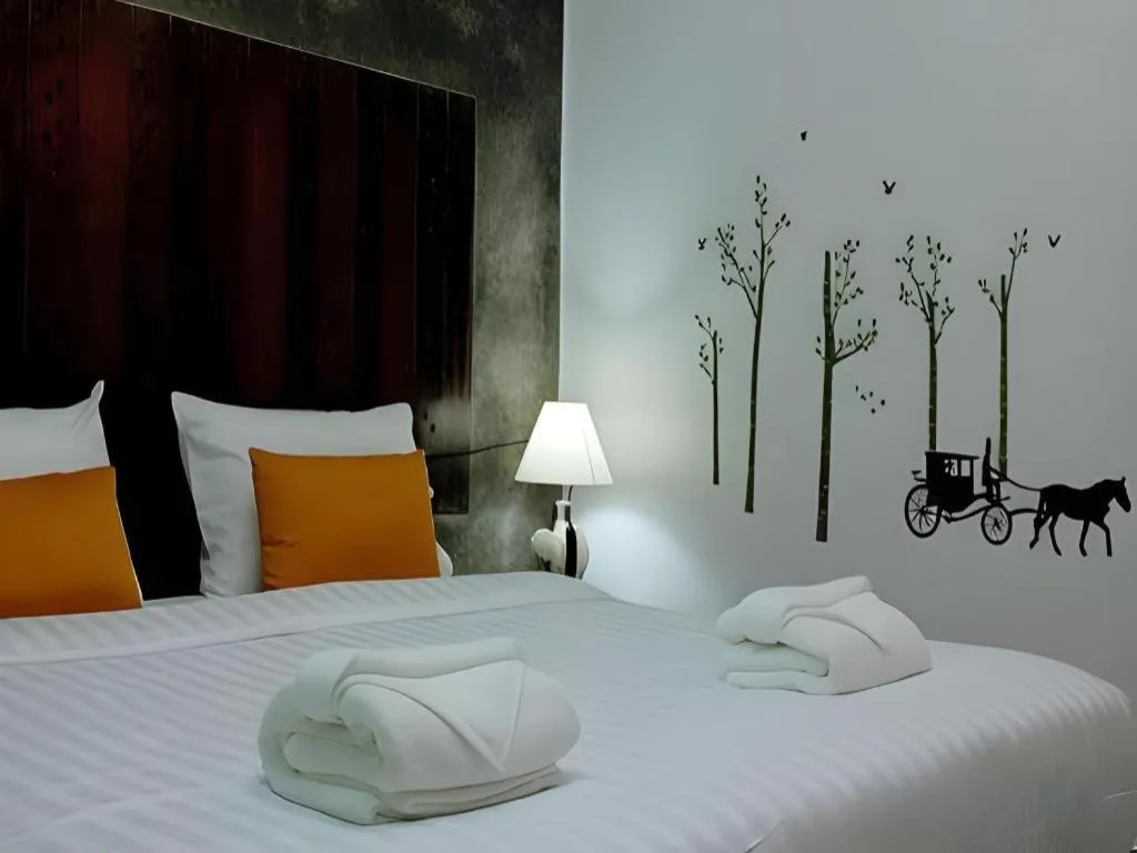 Bed in Ladawan Boutique Hotel