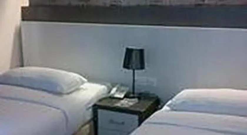 Bed in Hotel Benua Bed in Hotel Benua