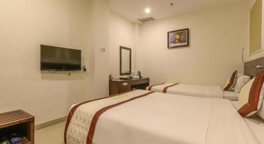 Bed in Ocean View Danang Hotel