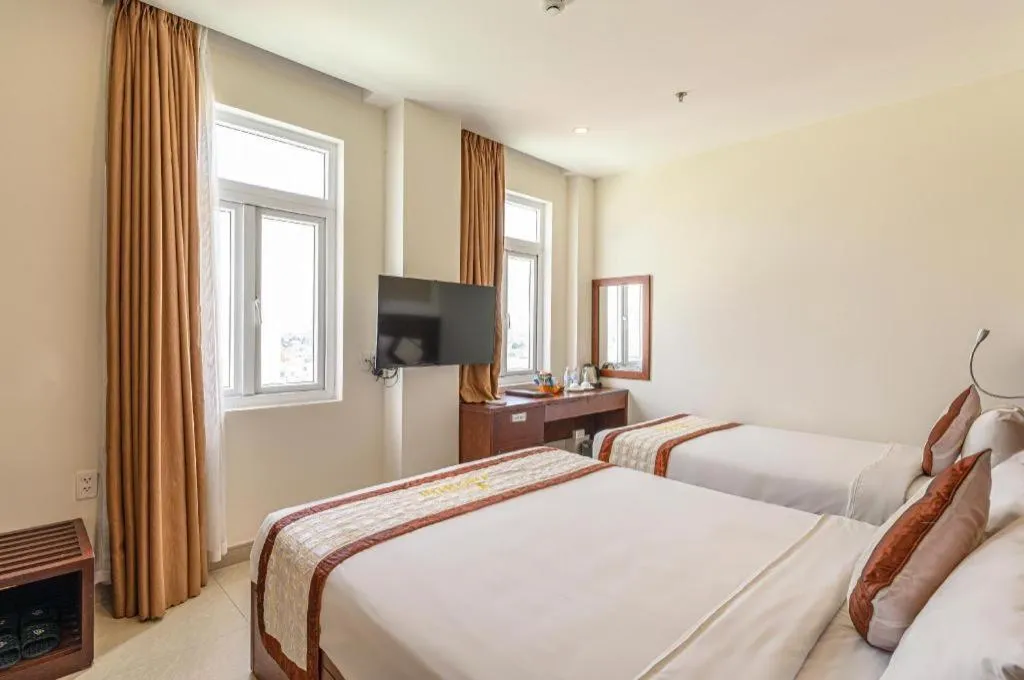 Bed in Ocean View Danang Hotel