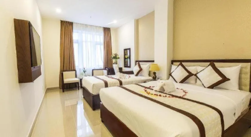 Bed in Ocean View Danang Hotel