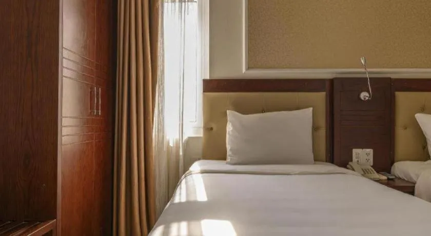 Bed in Ocean View Danang Hotel