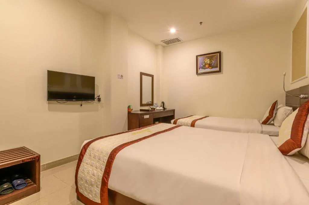 Bed in Ocean View Danang Hotel