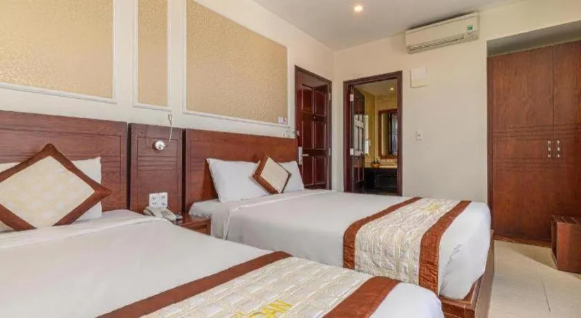 Bed in Ocean View Danang Hotel