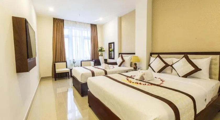 Bed in Ocean View Danang Hotel