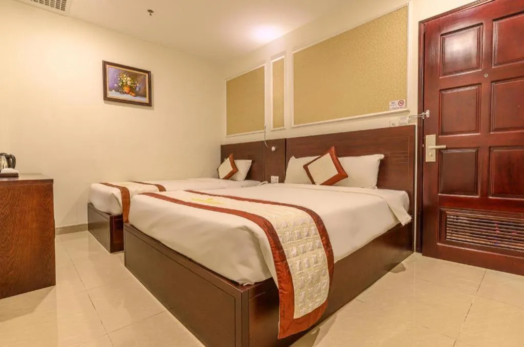 Bed in Ocean View Danang Hotel