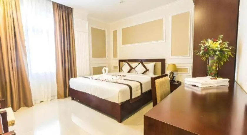 Bed in Ocean View Danang Hotel
