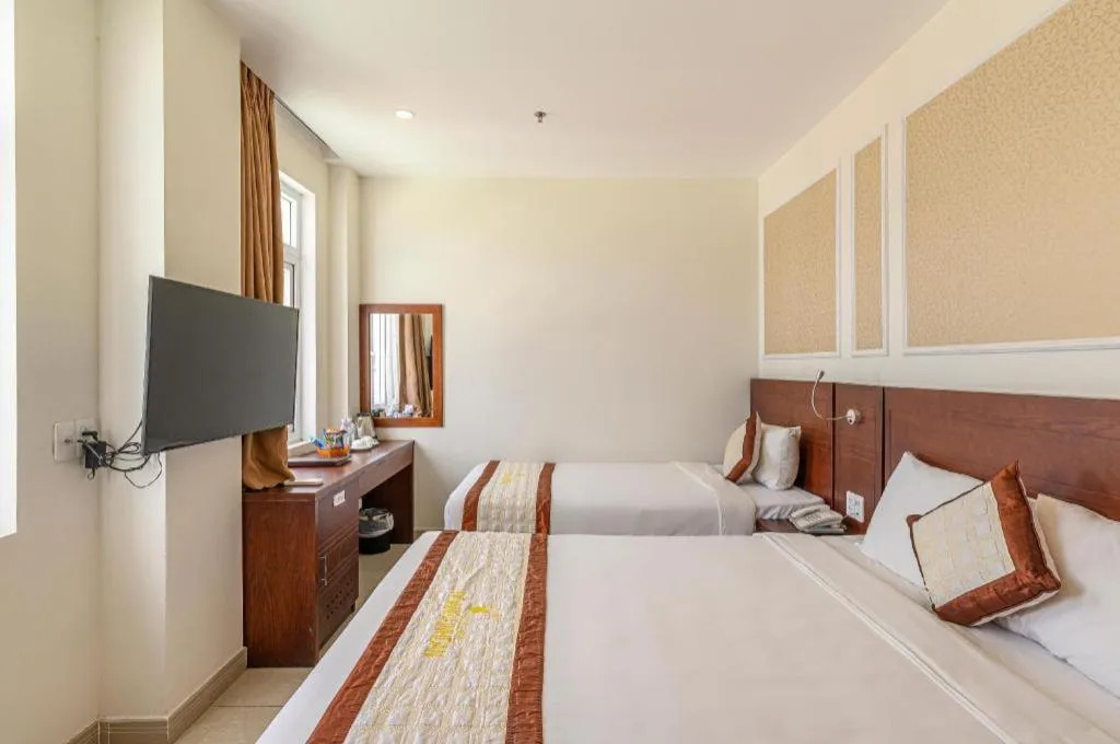 Bed in Ocean View Danang Hotel