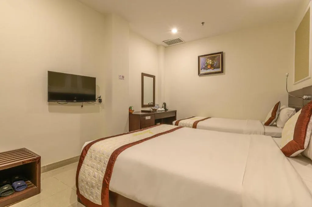 Bed in Ocean View Danang Hotel