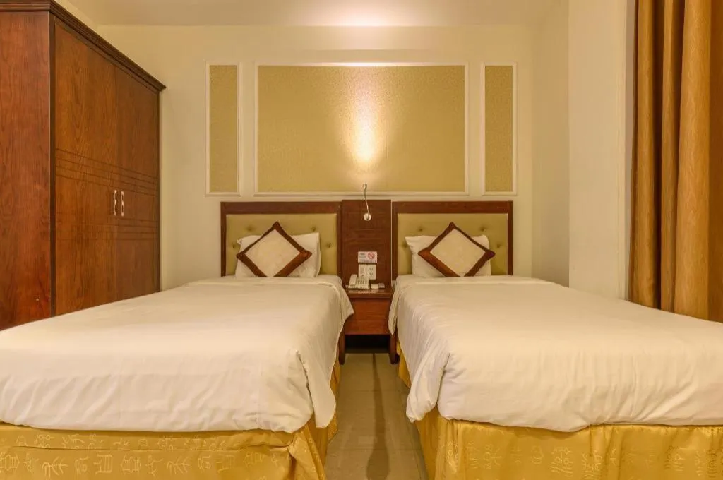 Bed in Ocean View Danang Hotel