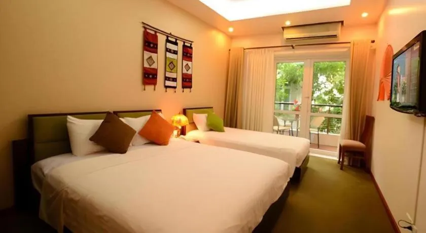 Bed in Artisan Boutique Hotel