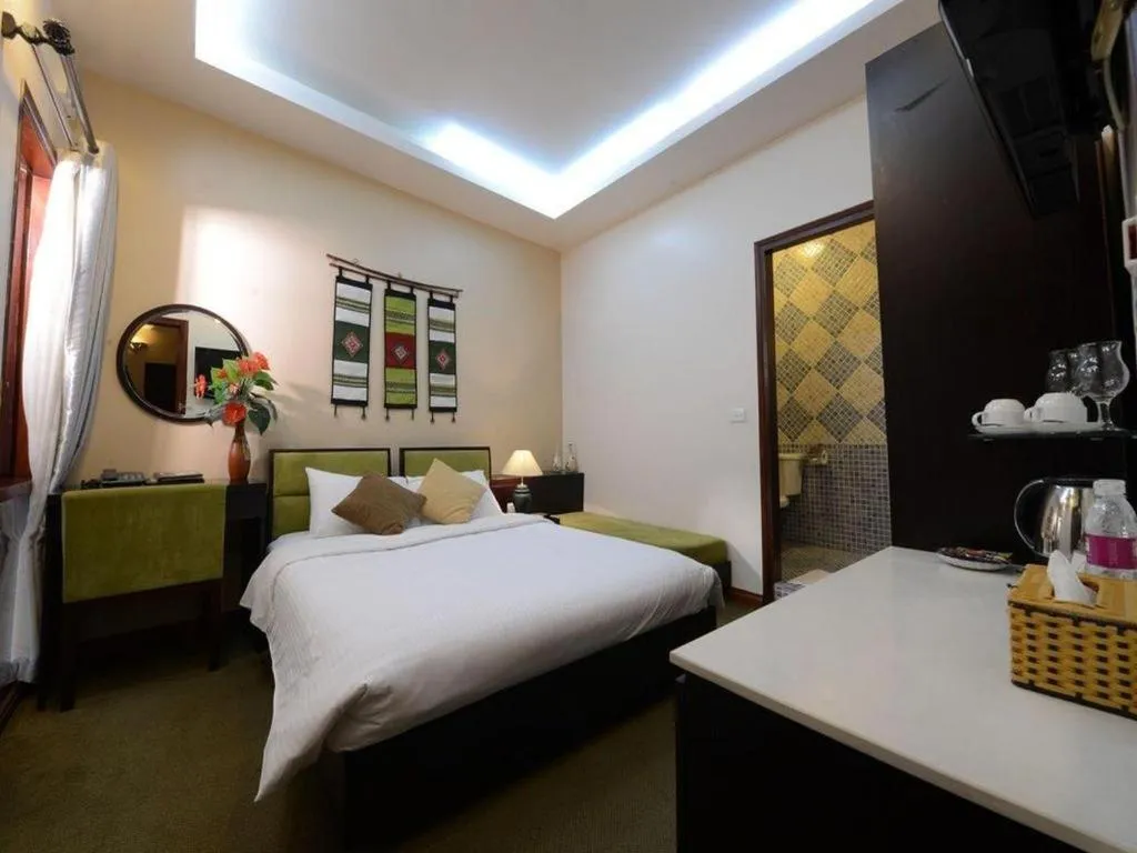 Bed in Artisan Boutique Hotel