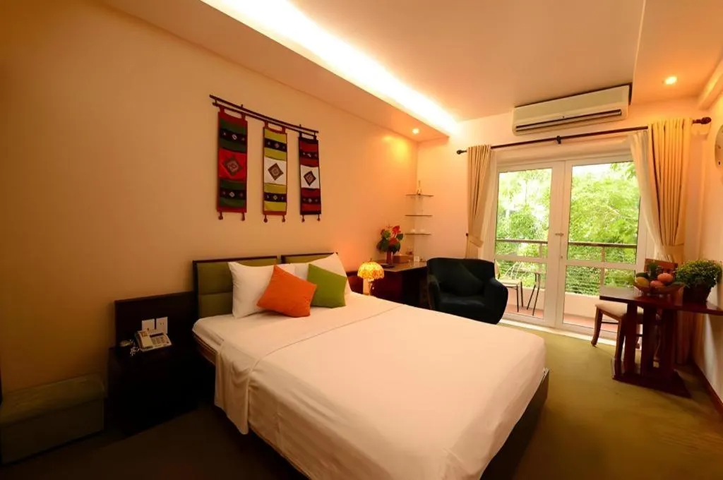 Bed in Artisan Boutique Hotel