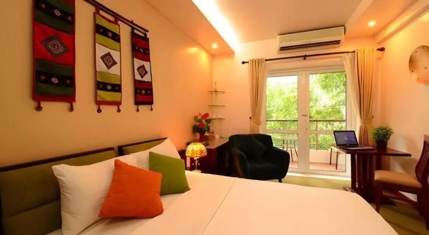 Bed in Artisan Boutique Hotel