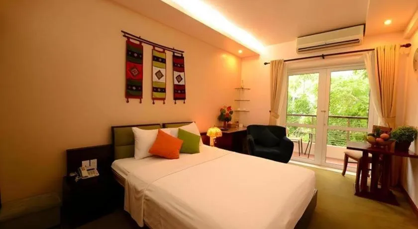 Bed in Artisan Boutique Hotel