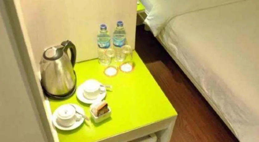 Bed in Everbright Ambon Hotel