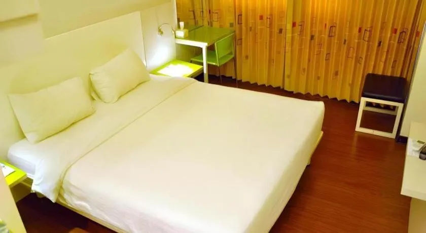 Bed in Everbright Ambon Hotel