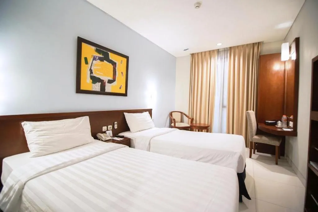 Bed in Sofyan Hotel Soepomo