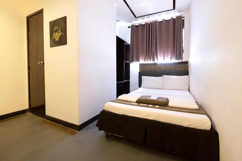 Bed in Hotel Henrico Kisad