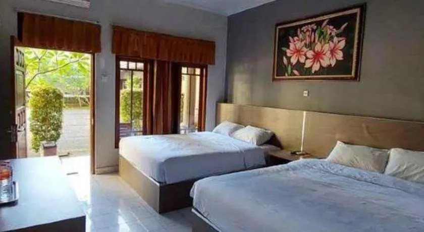 Bed in Grand Mutiara Hotel