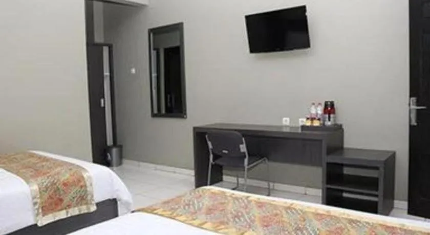 Bed in Grand Mutiara Hotel