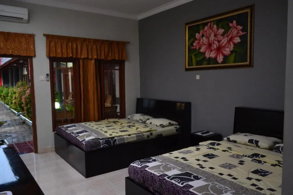 Bed in Grand Mutiara Hotel