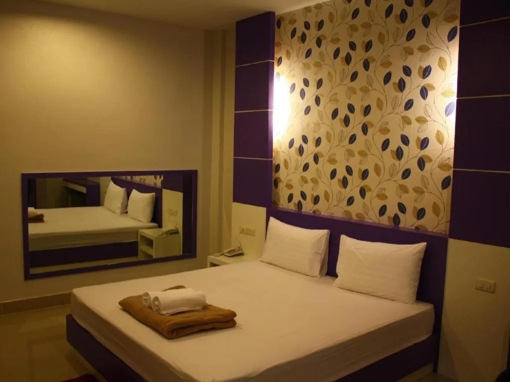 Bed in Sabai Ez Hotel