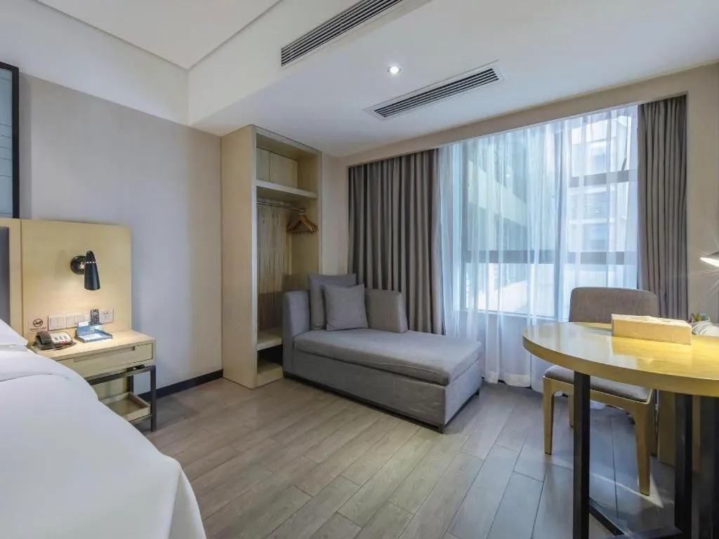 Bed in Echarm Hotel Beihai Railway Station