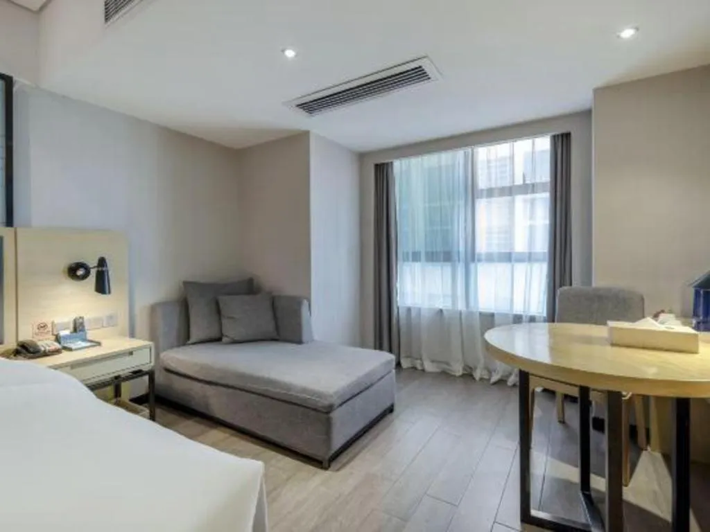 Bed in Echarm Hotel Beihai Railway Station