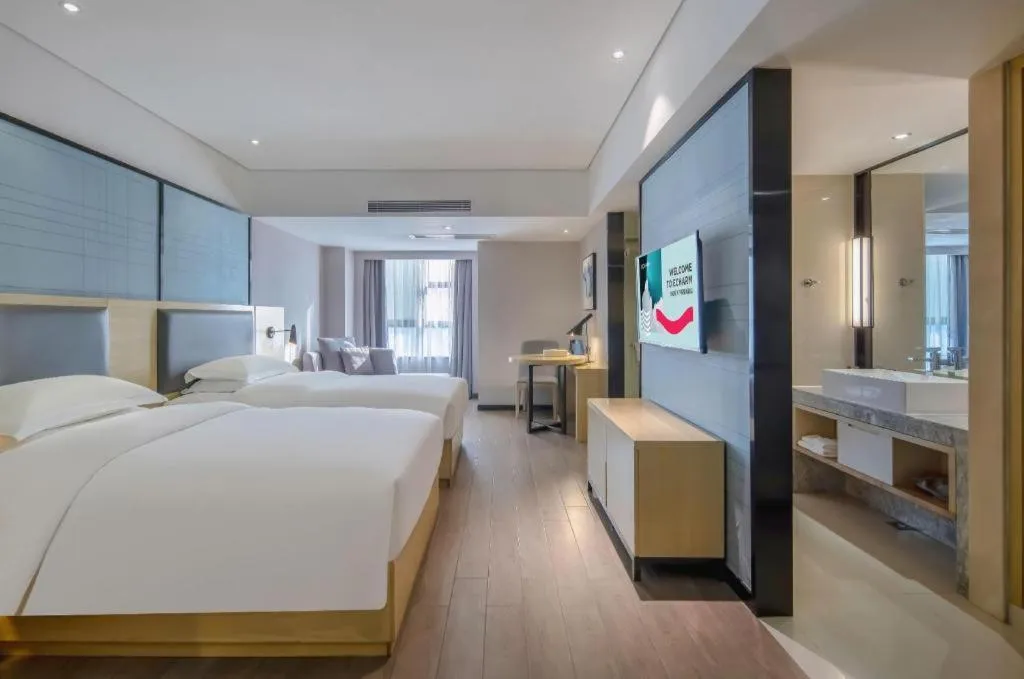 Bed in Echarm Hotel Beihai Railway Station
