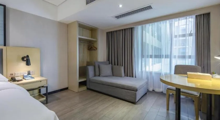 Bed in Echarm Hotel Beihai Railway Station