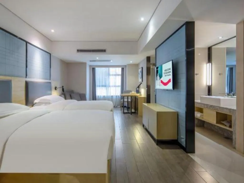 Bed in Echarm Hotel Beihai Railway Station