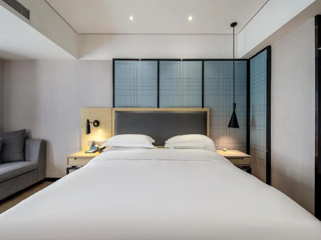 Bed in Echarm Hotel Beihai Railway Station