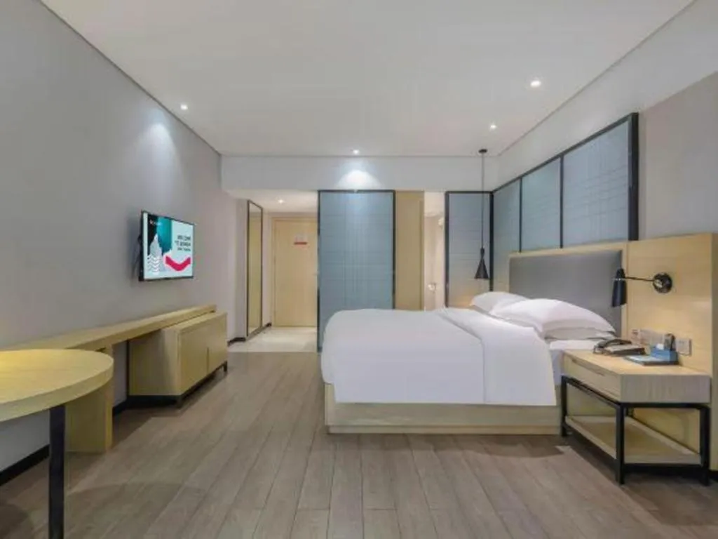 Bed in Echarm Hotel Beihai Railway Station