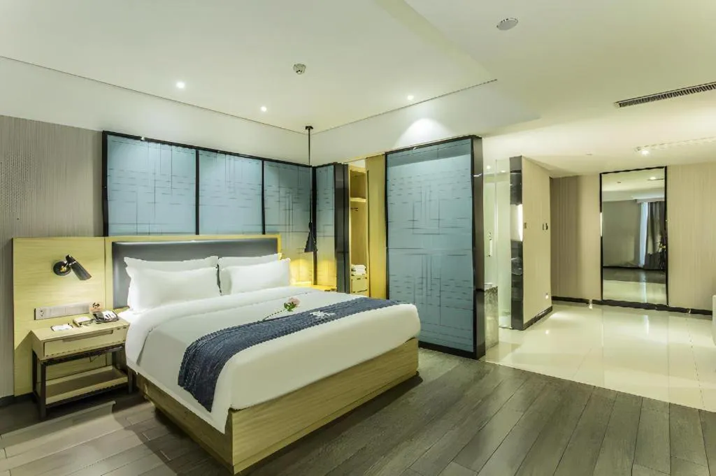 Bed in Echarm Hotel Beihai Railway Station