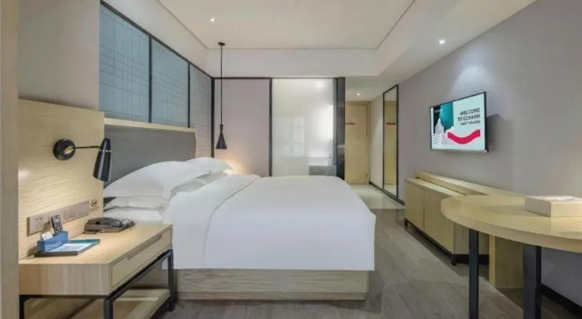 Bed in Echarm Hotel Beihai Railway Station