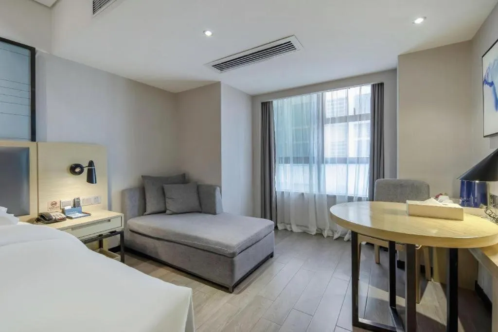 Bed in Echarm Hotel Beihai Railway Station