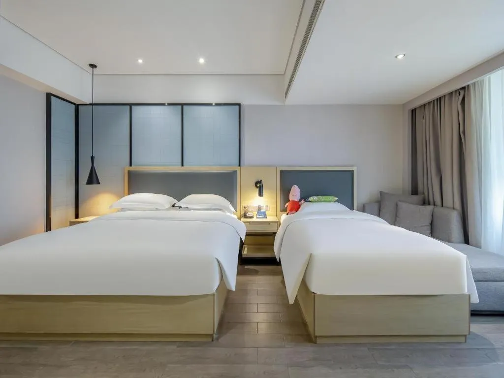 Bed in Echarm Hotel Beihai Railway Station