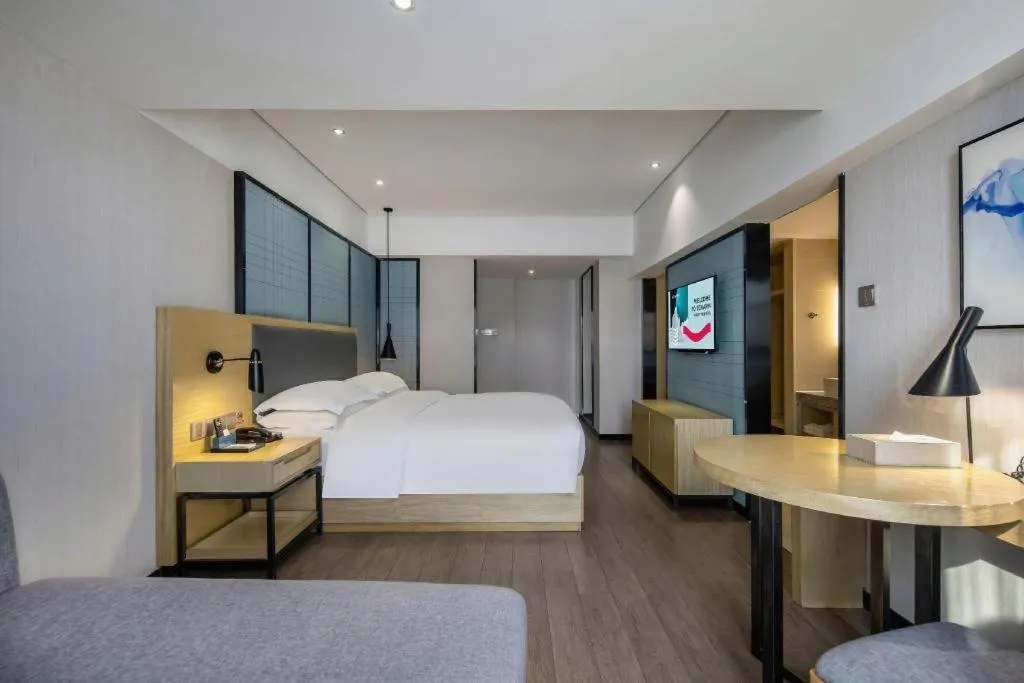 Bed in Echarm Hotel Beihai Railway Station