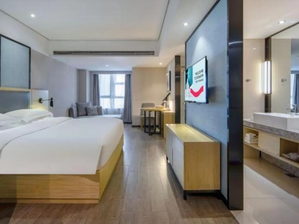 Bed in Echarm Hotel Beihai Railway Station