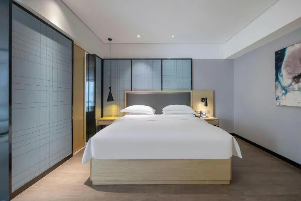 Bed in Echarm Hotel Beihai Railway Station