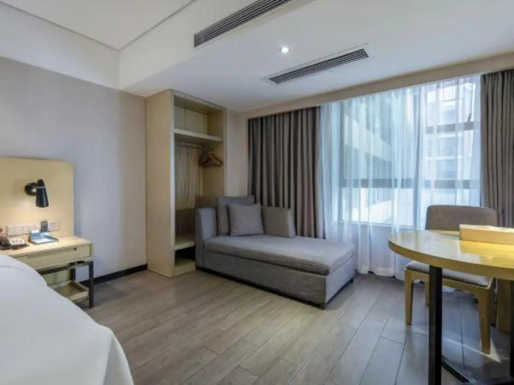 Bed in Echarm Hotel Beihai Railway Station