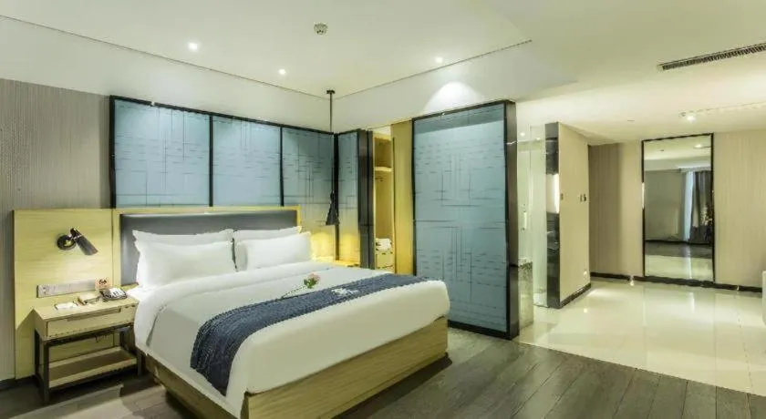 Bed in Echarm Hotel Beihai Railway Station